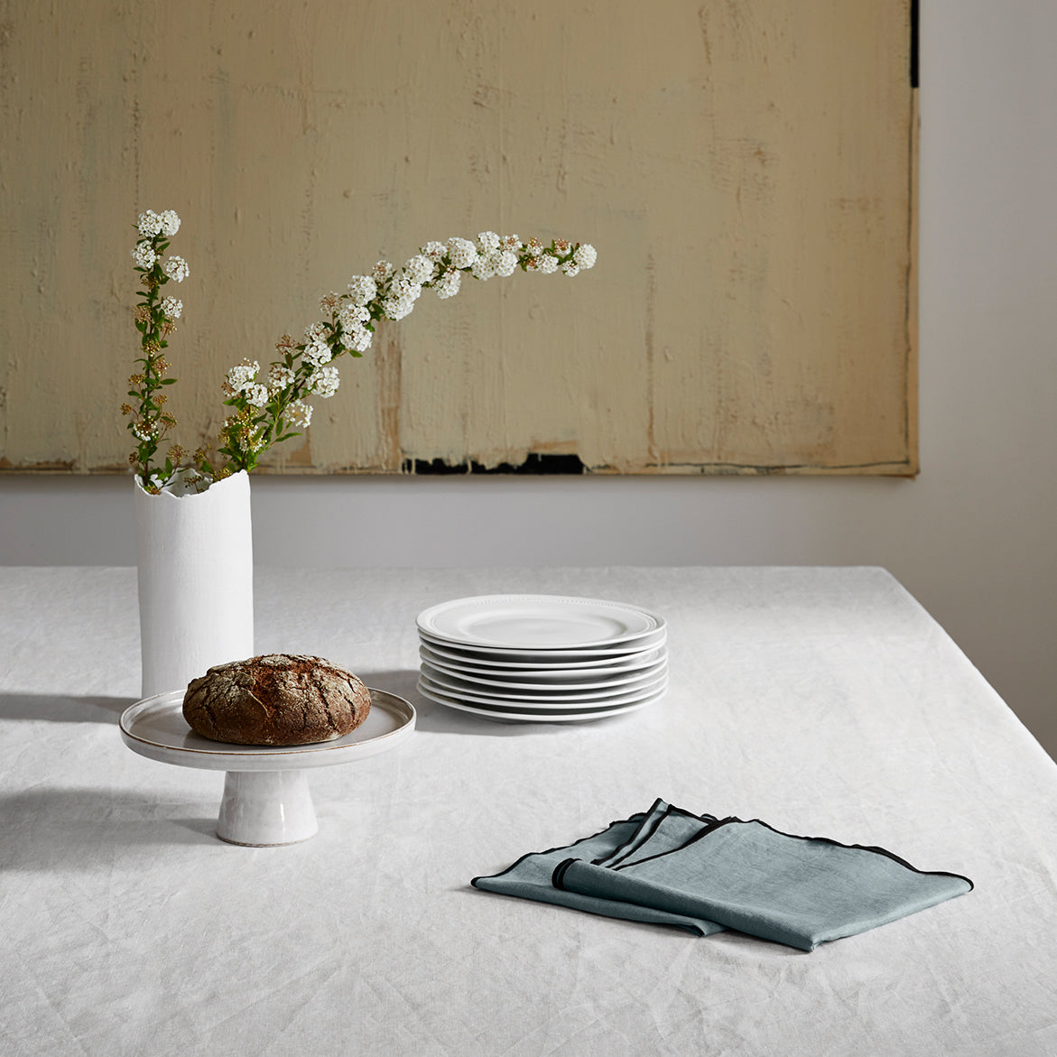 Nappe carrée CARLINA blanc pur et bourdon noir